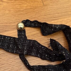 CHANEL 2025 boutique charm with ribbon